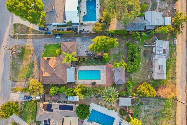 a front view of a house with swimming pool