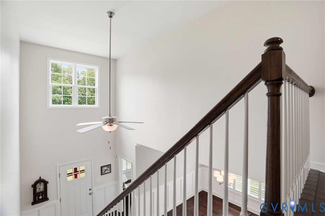8907 Lavenham Loop Midlothian, VA 23112 - Photo 34 of 57 Stairs to second level looking down at entrance fo