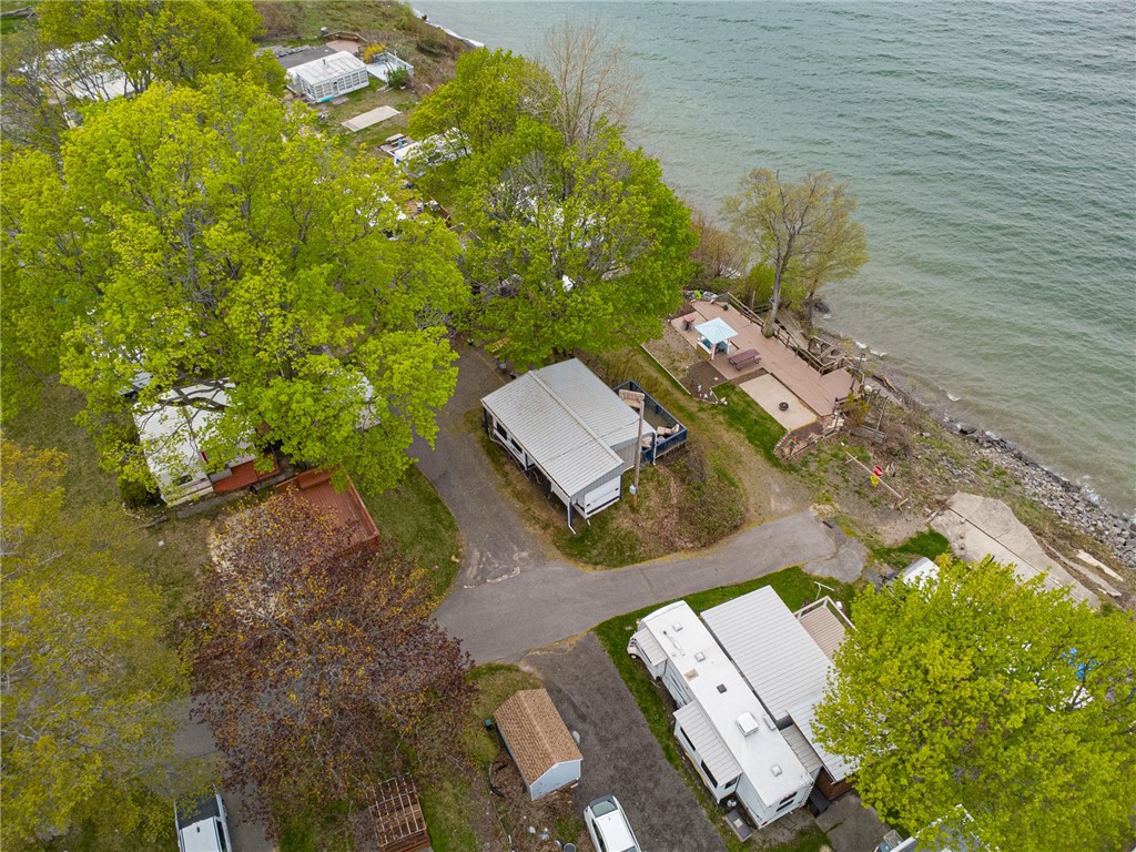 7945 Lake Road, Unit 86 Sodus, NY 14555 - Photo 20 of 22 The deck is a wonder place to enjoy your morning b
