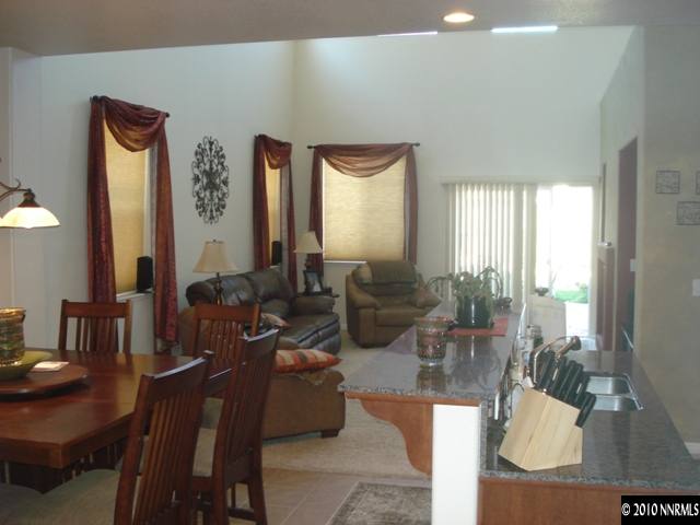 599 Needles Court Reno, NV 89521 - Photo 3 of 13 a living room with furniture and a large window