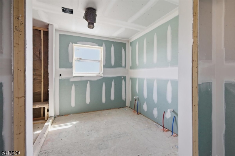 6 Spring Street Phillipsburg, NJ 08865 - Photo 24 of 31 a view of an empty room with cabinet and a window