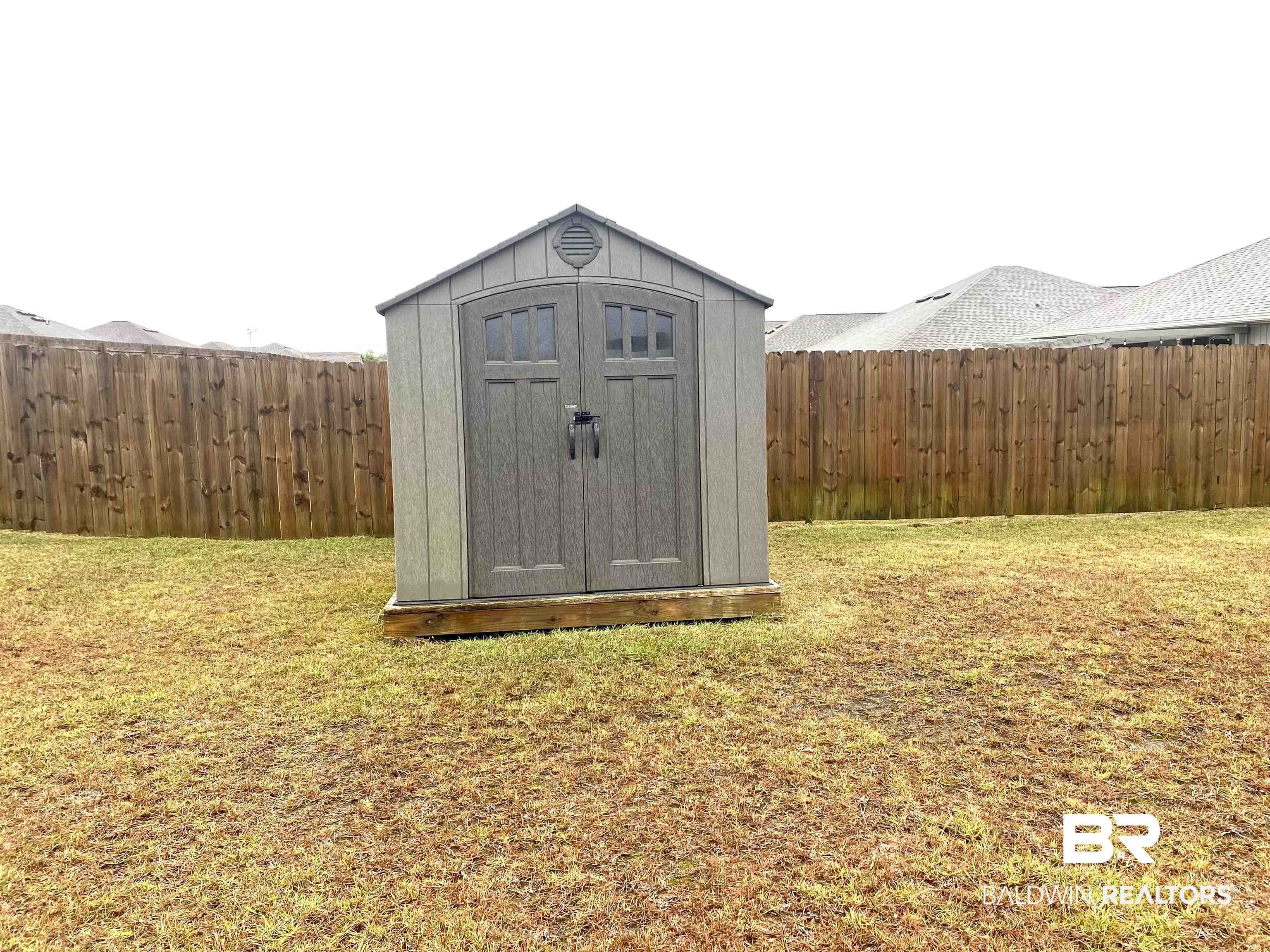 14496 Cavendish Drive Foley, AL 36535 - Photo 25 of 26 View of shed with a fenced backyard