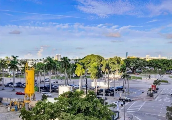 a view of swimming pool with outdoor seating