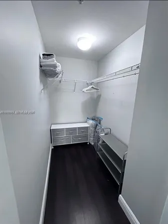 a view of a room with racks on the wall