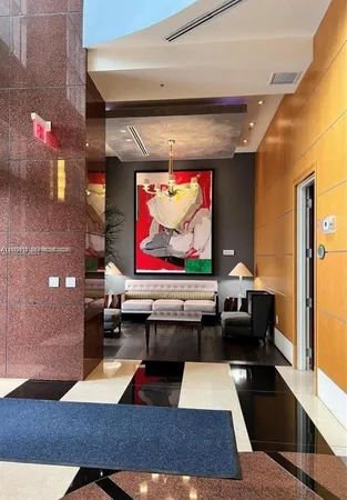 a room with furniture and rug