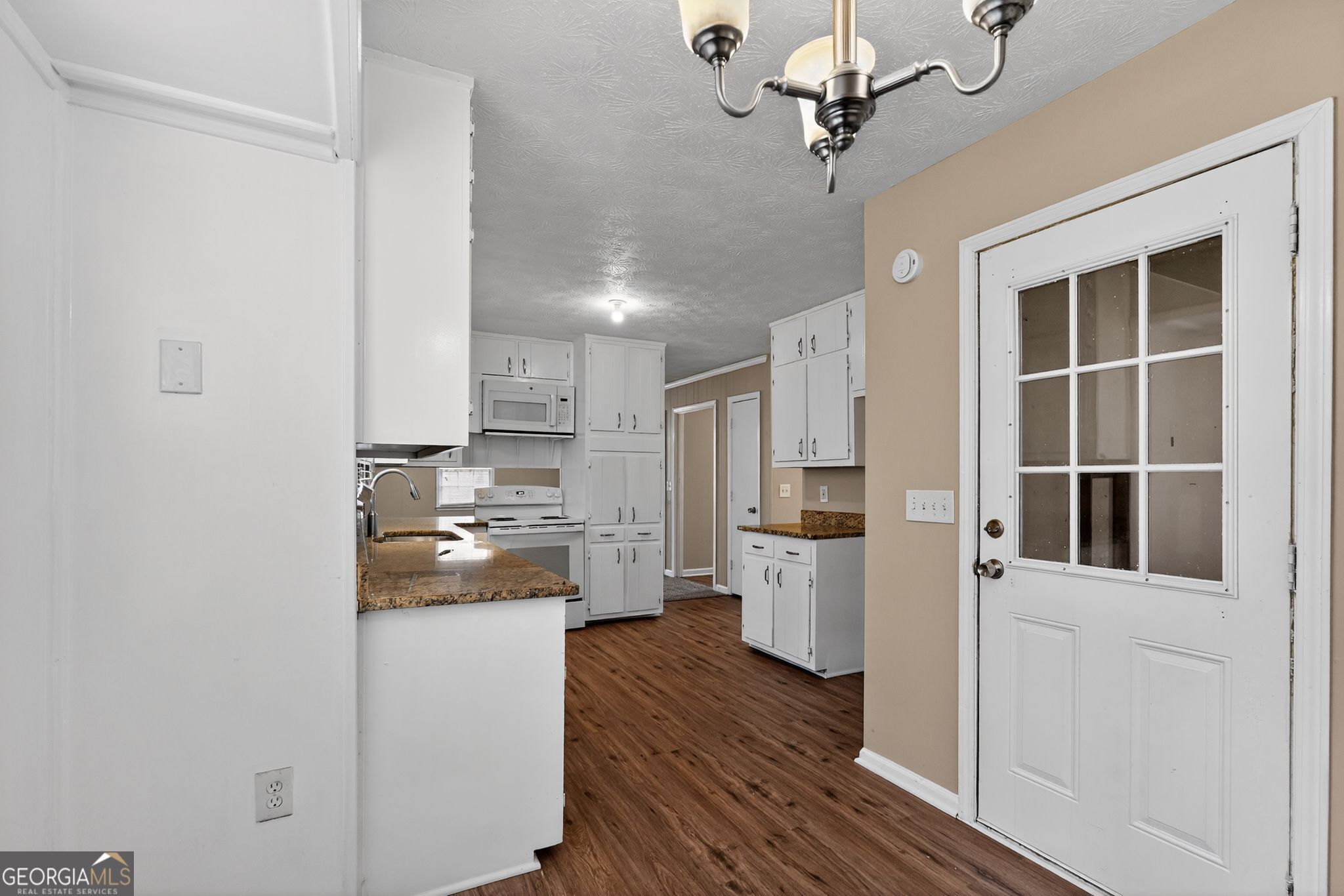 4716 Jakes Trail Decatur, GA 30034 - Photo 12 of 34 a kitchen with stainless steel appliances a refrigerator and a stove top oven