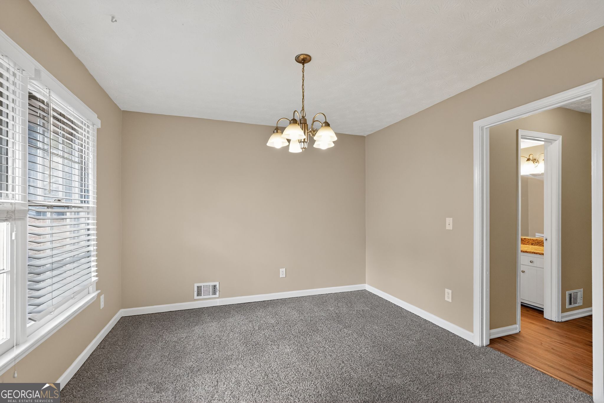 4716 Jakes Trail Decatur, GA 30034 - Photo 14 of 34 wooden floor in an empty room with a window