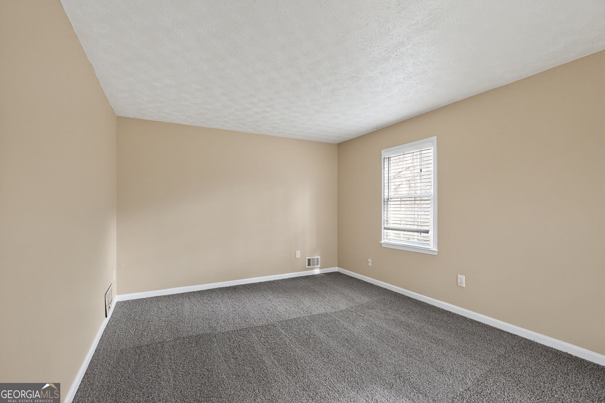 4716 Jakes Trail Decatur, GA 30034 - Photo 18 of 34 an empty room with a window