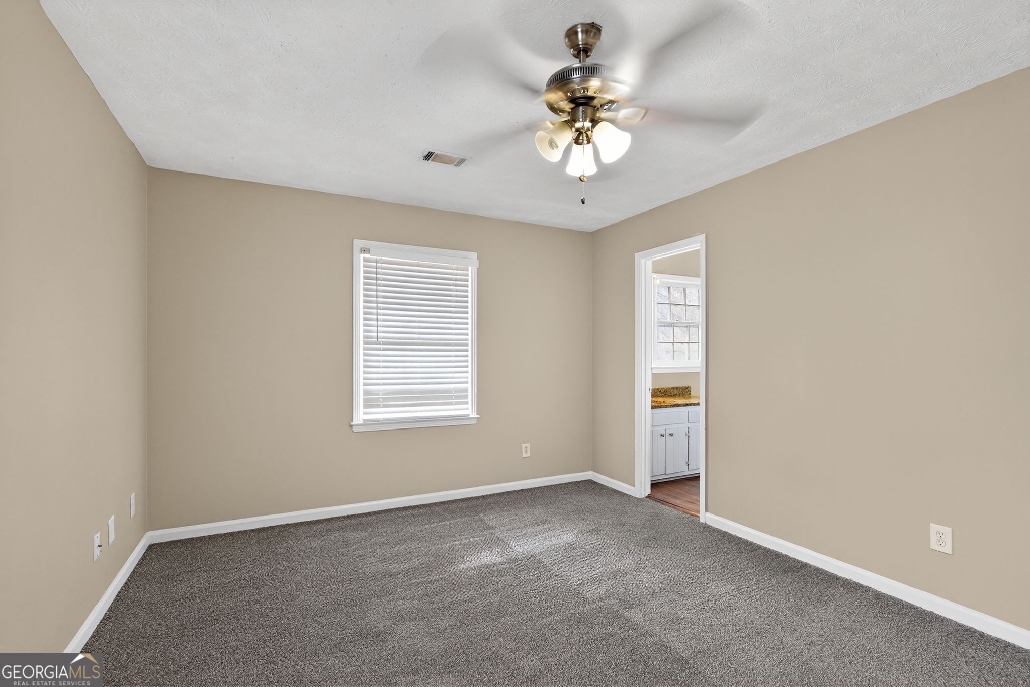 4716 Jakes Trail Decatur, GA 30034 - Photo 20 of 34 a view of an empty room with a window
