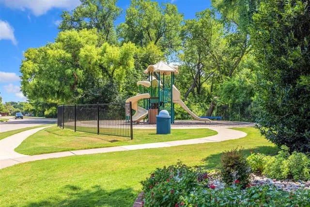 a view of a swimming pool with an outdoor space