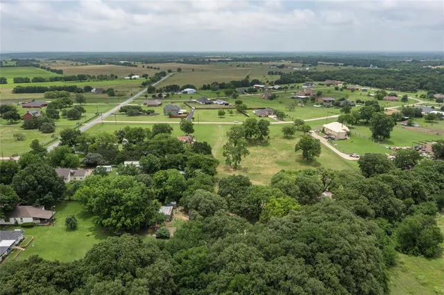 a view of a city with lots of trees