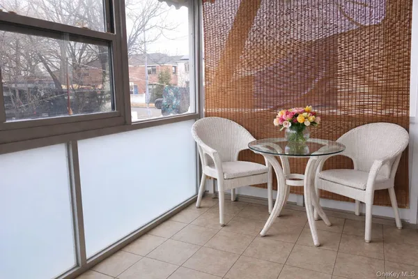 a view of a car parked in front of a building