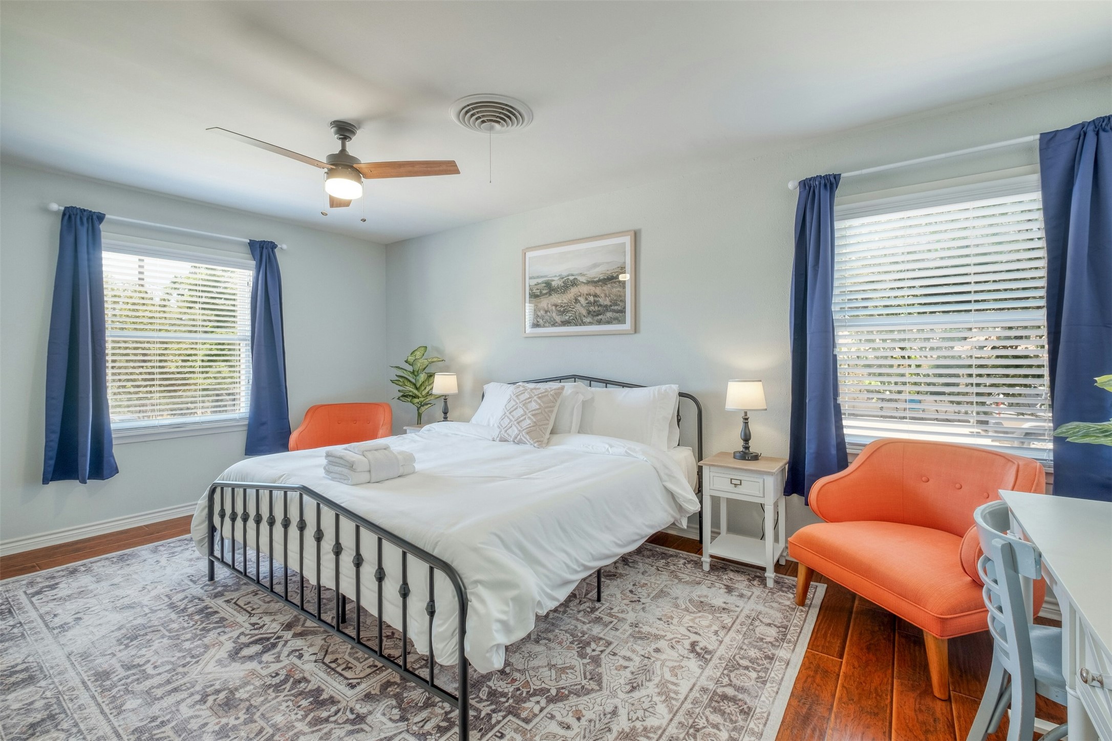 1208 Country Club Road Georgetown, TX 78628 - Photo 17 of 25 a bedroom with a bed and a table in it