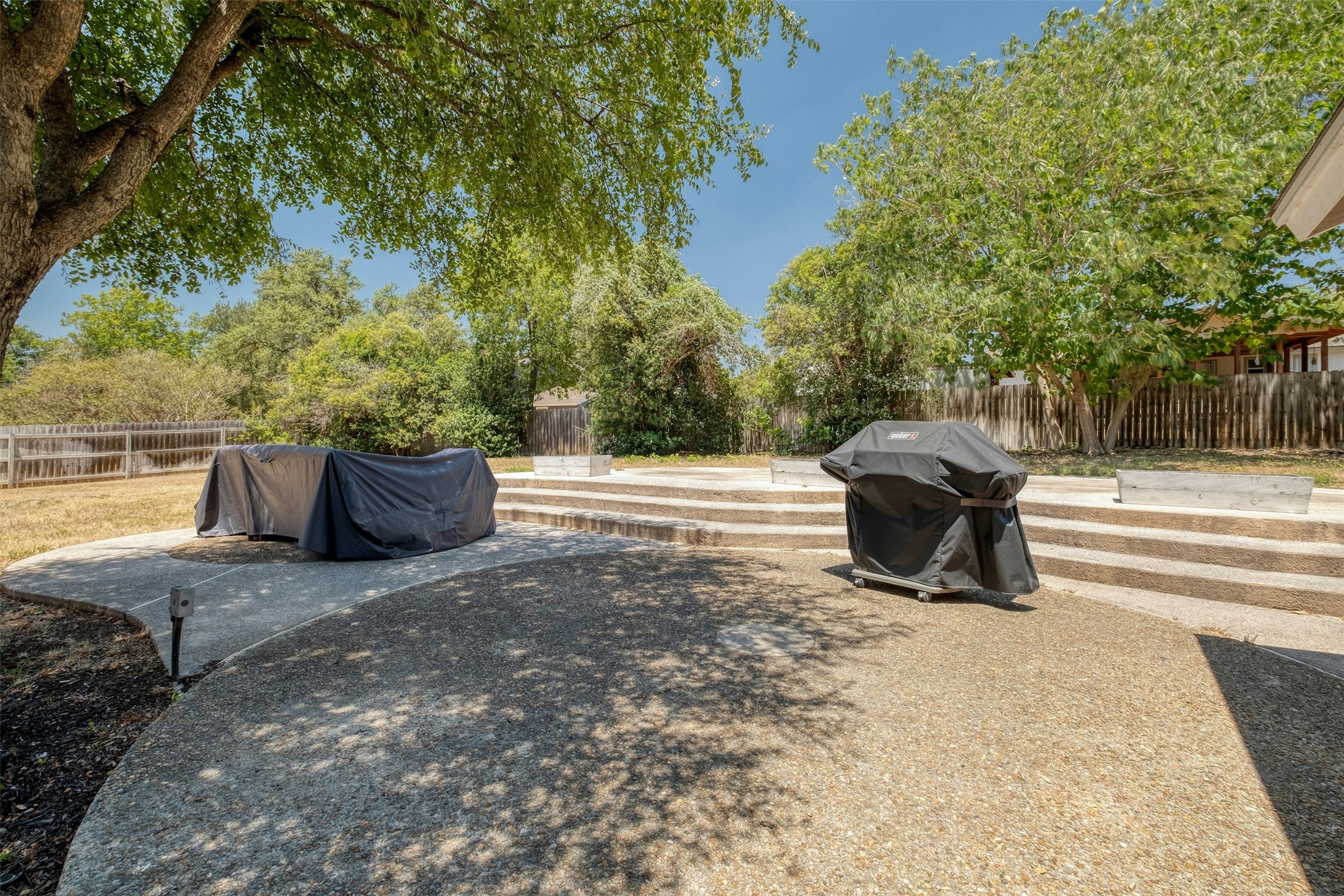 1208 Country Club Road Georgetown, TX 78628 - Photo 24 of 25 a view of backyard with trees