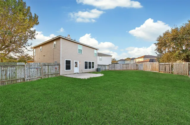 a view of a backyard with a garden