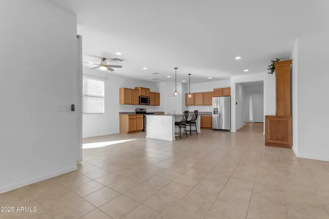 a kitchen that has a cabinets and a stove in it