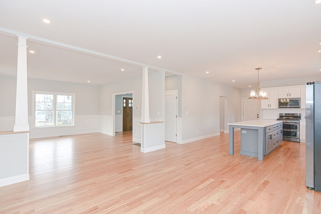 3 Badus Brook Road Wrentham, MA 02093 - Photo 11 of 38 a view of kitchen with sink and refrigerator
