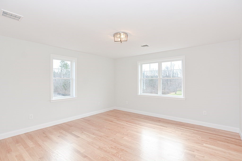 3 Badus Brook Road Wrentham, MA 02093 - Photo 29 of 38 an empty room with a window