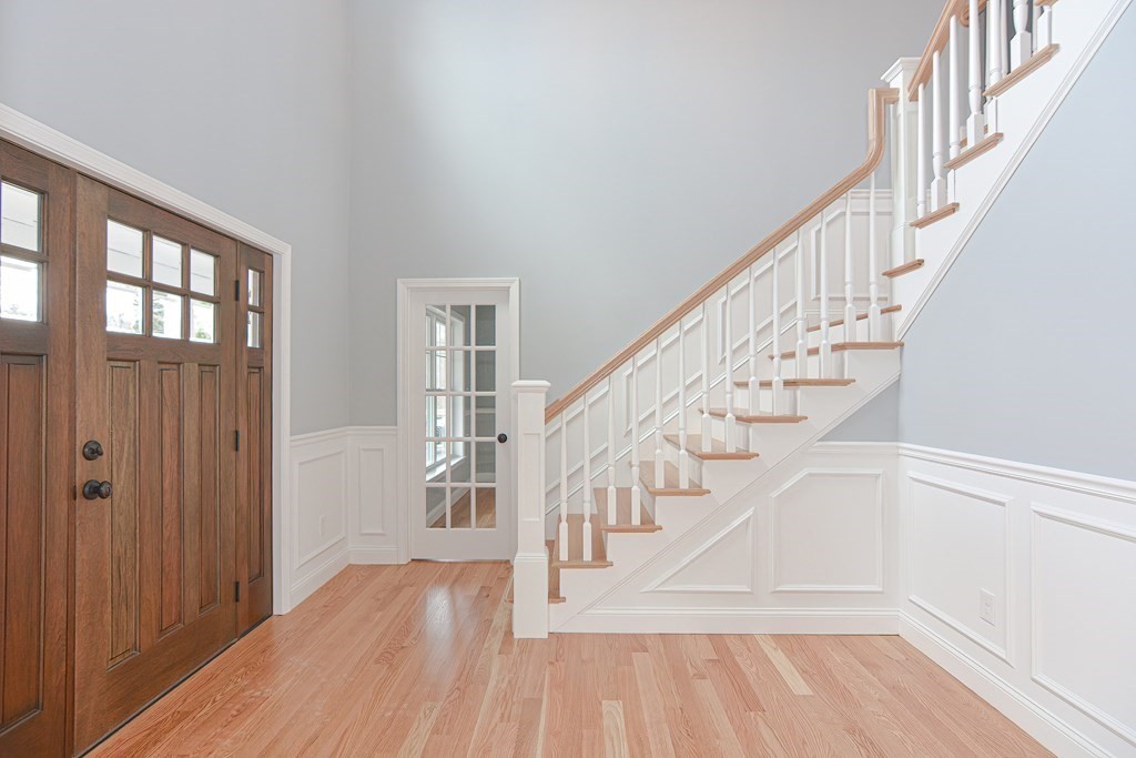 3 Badus Brook Road Wrentham, MA 02093 - Photo 6 of 38 a view of entryway and hall with wooden floor