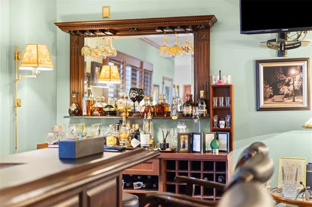 a view of a living room with furniture and a window