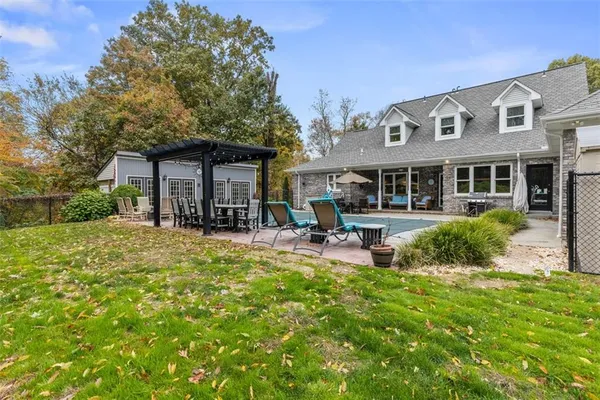 a view of a house with a patio