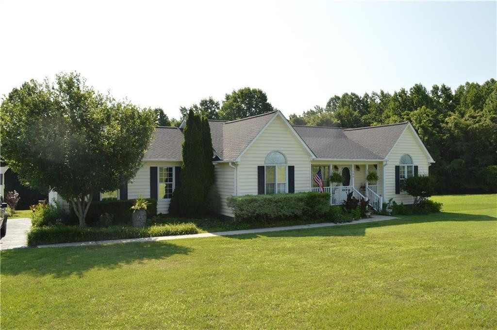 134 Collin Drive Roxboro, NC 27574 - Photo 3 of 7 a front view of a house with garden