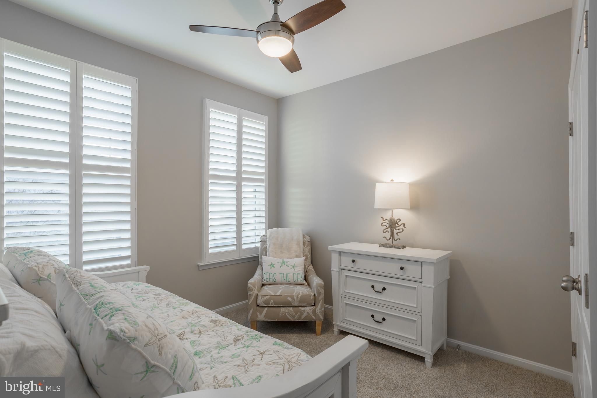 34491 Spring Brook Avenue Lewes, DE 19958 - Photo 33 of 59 a bedroom with a bed and a window
