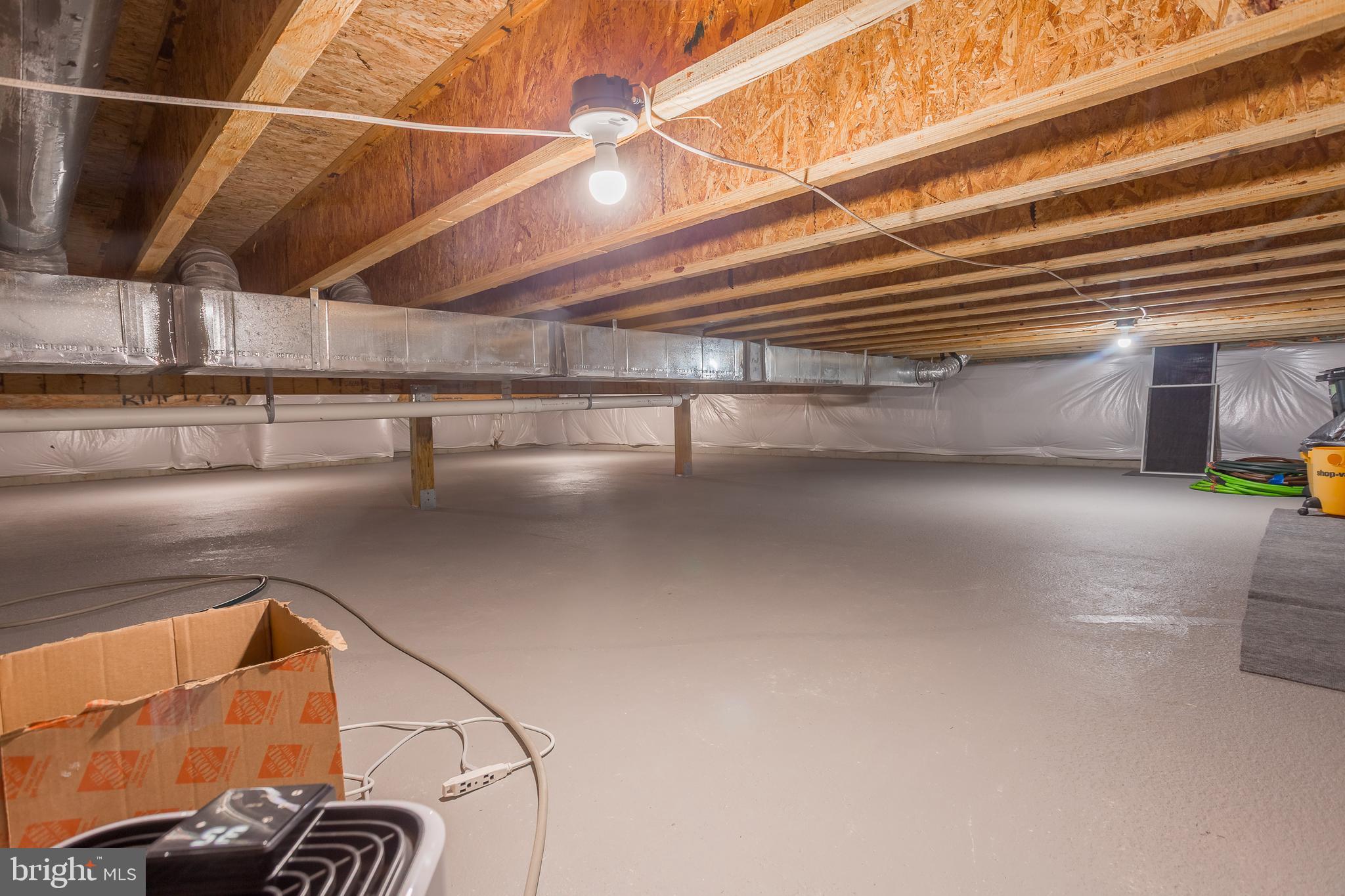 34491 Spring Brook Avenue Lewes, DE 19958 - Photo 35 of 59 a view of a room with racks on the wall