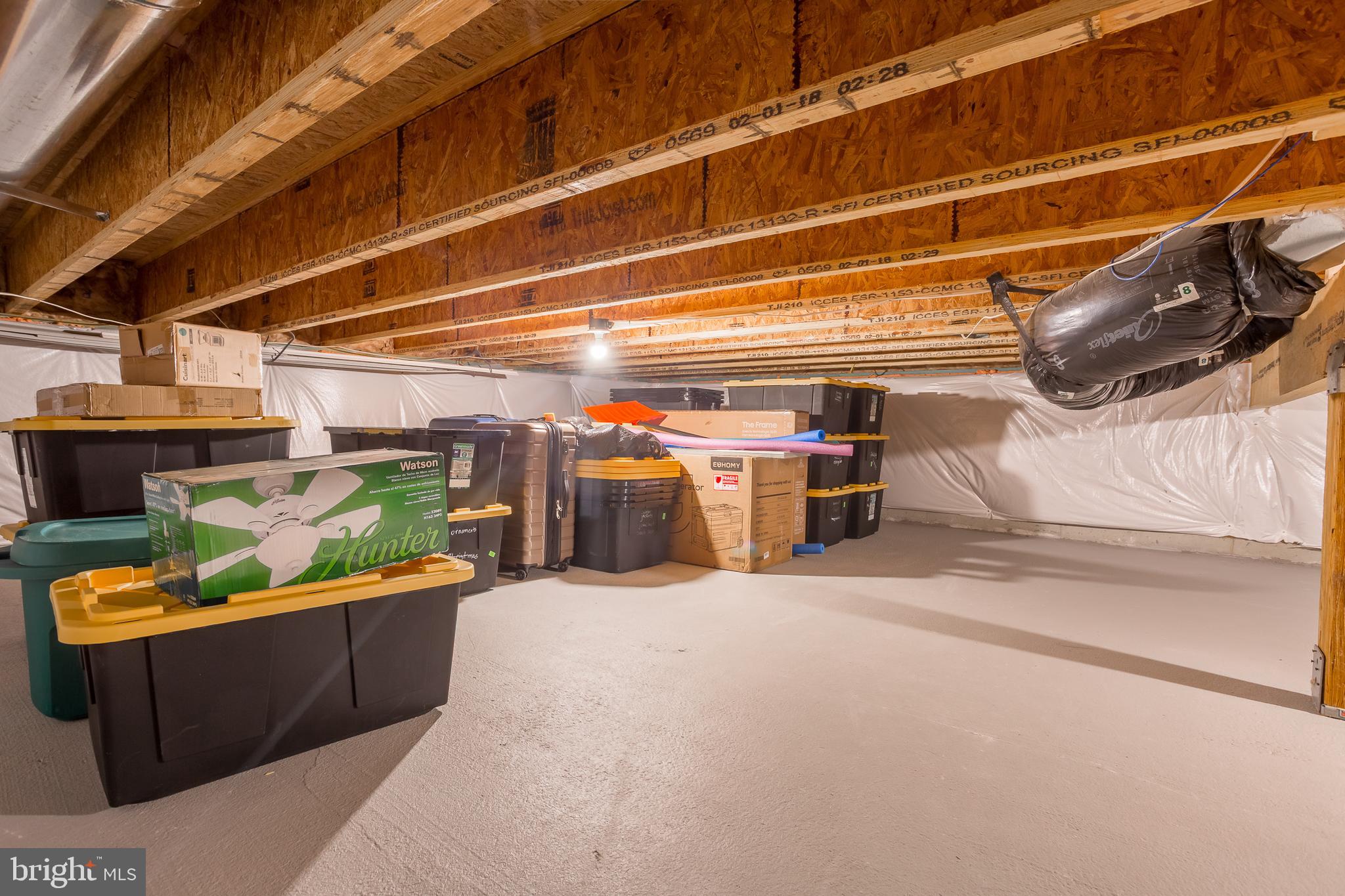 34491 Spring Brook Avenue Lewes, DE 19958 - Photo 36 of 59 a view of a storage room with a lot of stuff