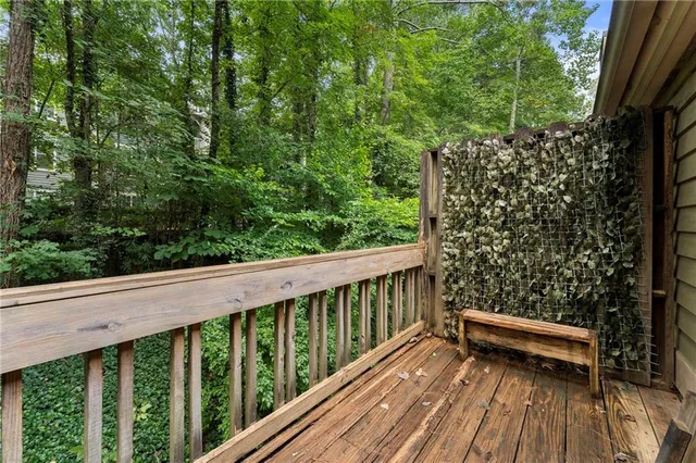 a view of balcony with wooden floor and outdoor space