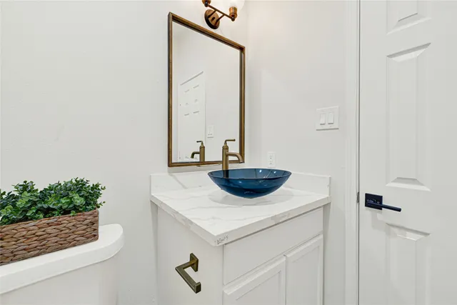 a kitchen with a sink and a stove