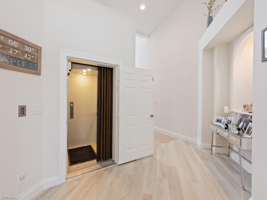 139 Colonade Circle Naples, FL 34103 - Photo 6 of 32 Upper Foyer with Private Elevator