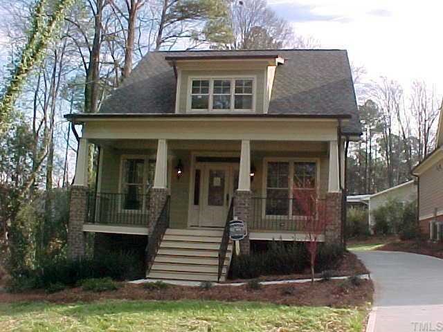 1106 North State Street Raleigh, NC 27604 - Photo 1 of 7 a front view of a house with a yard