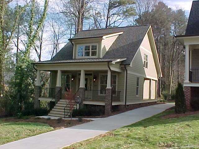 1106 North State Street Raleigh, NC 27604 - Photo 2 of 7 a front view of a house with a yard