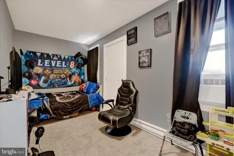 a room with furniture and a window