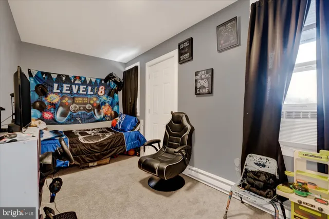 a room with furniture and a window