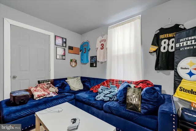 a living room with furniture and a couch