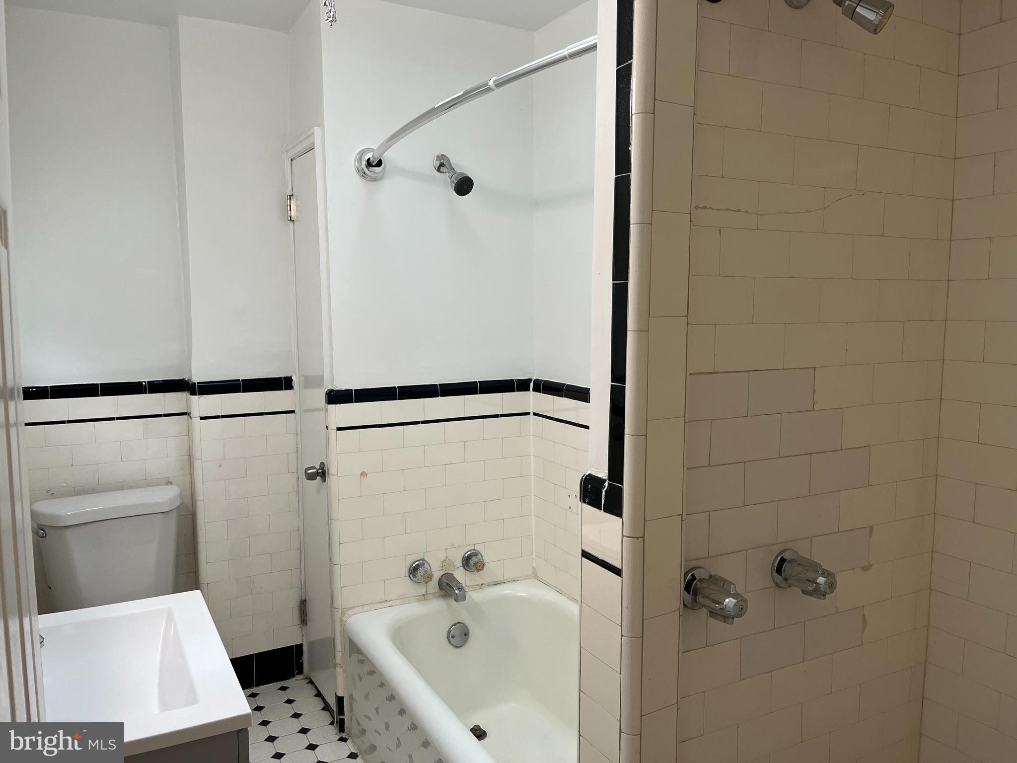 1323 Gilham Street Philadelphia, PA 19111 - Photo 16 of 35 a bathroom with a sink and a shower