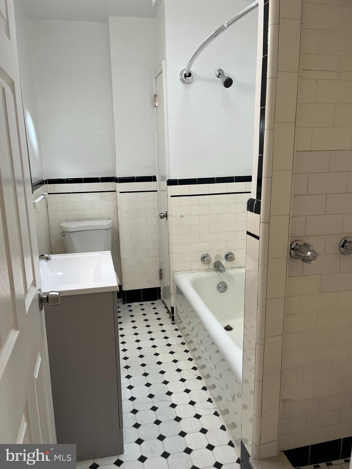 1323 Gilham Street Philadelphia, PA 19111 - Photo 19 of 35 a bathroom with a bathtub and a shower