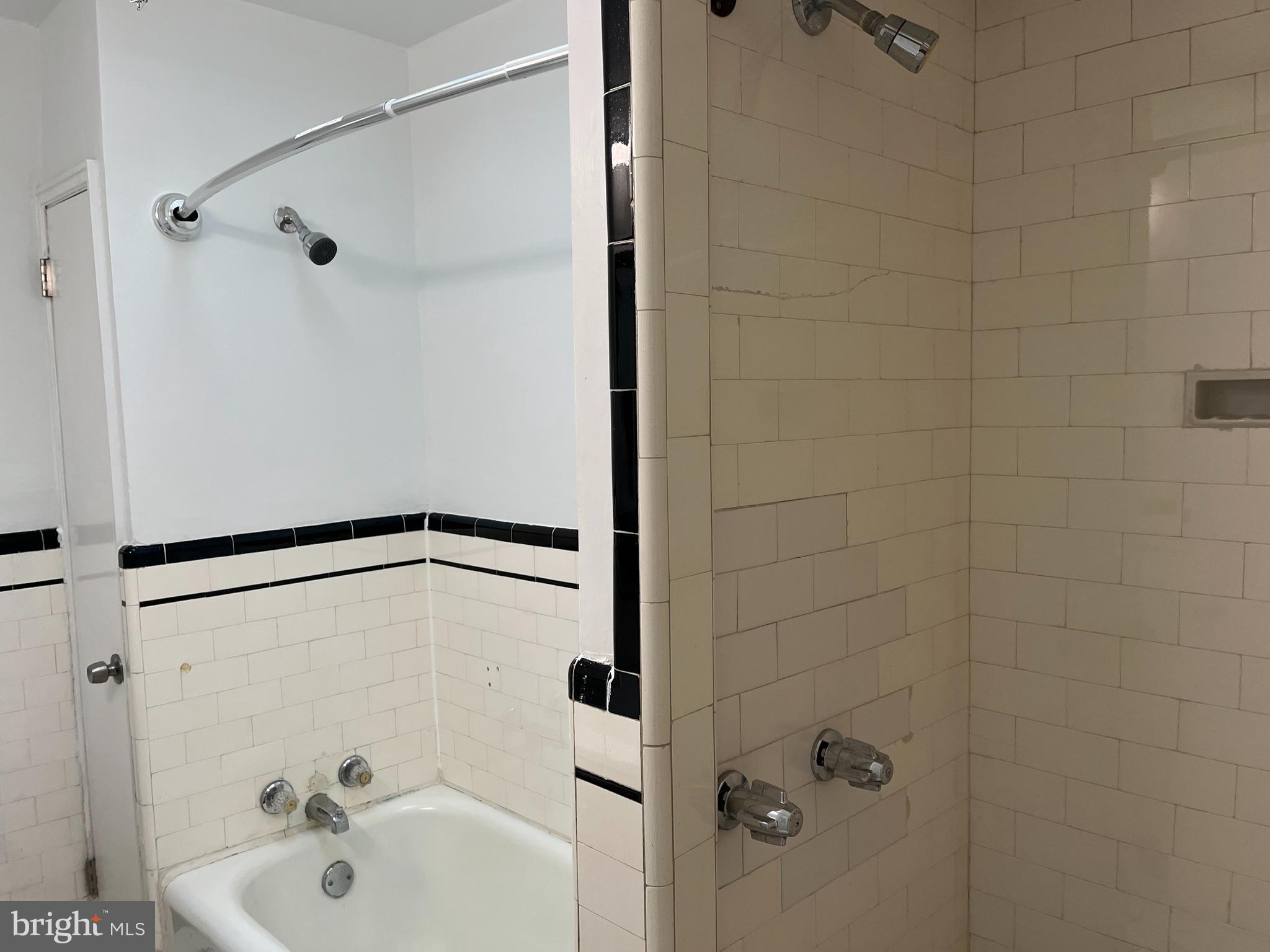 1323 Gilham Street Philadelphia, PA 19111 - Photo 21 of 35 a bathroom with a shower and a sink