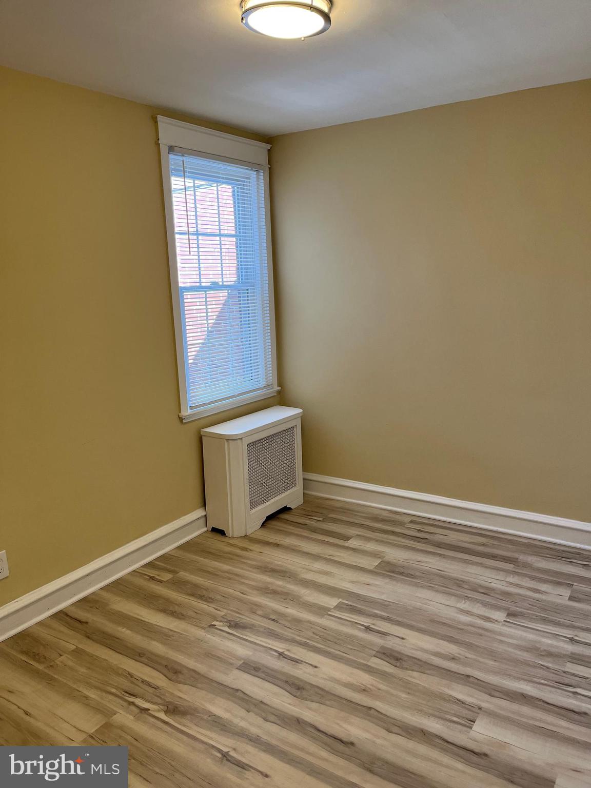 1323 Gilham Street Philadelphia, PA 19111 - Photo 22 of 35 a view of a room with wooden floor and window