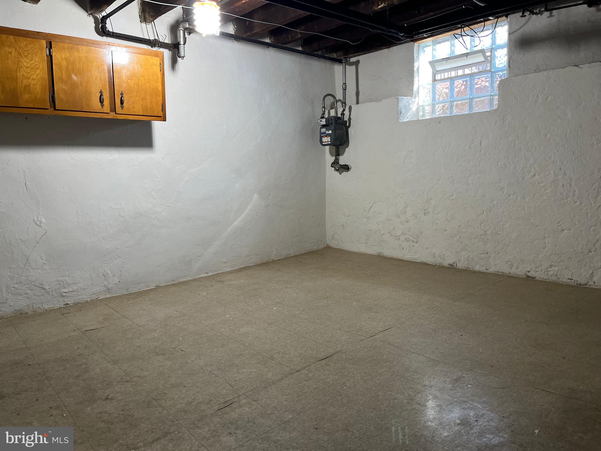 1323 Gilham Street Philadelphia, PA 19111 - Photo 26 of 35 a view of a room with wooden floor and windows