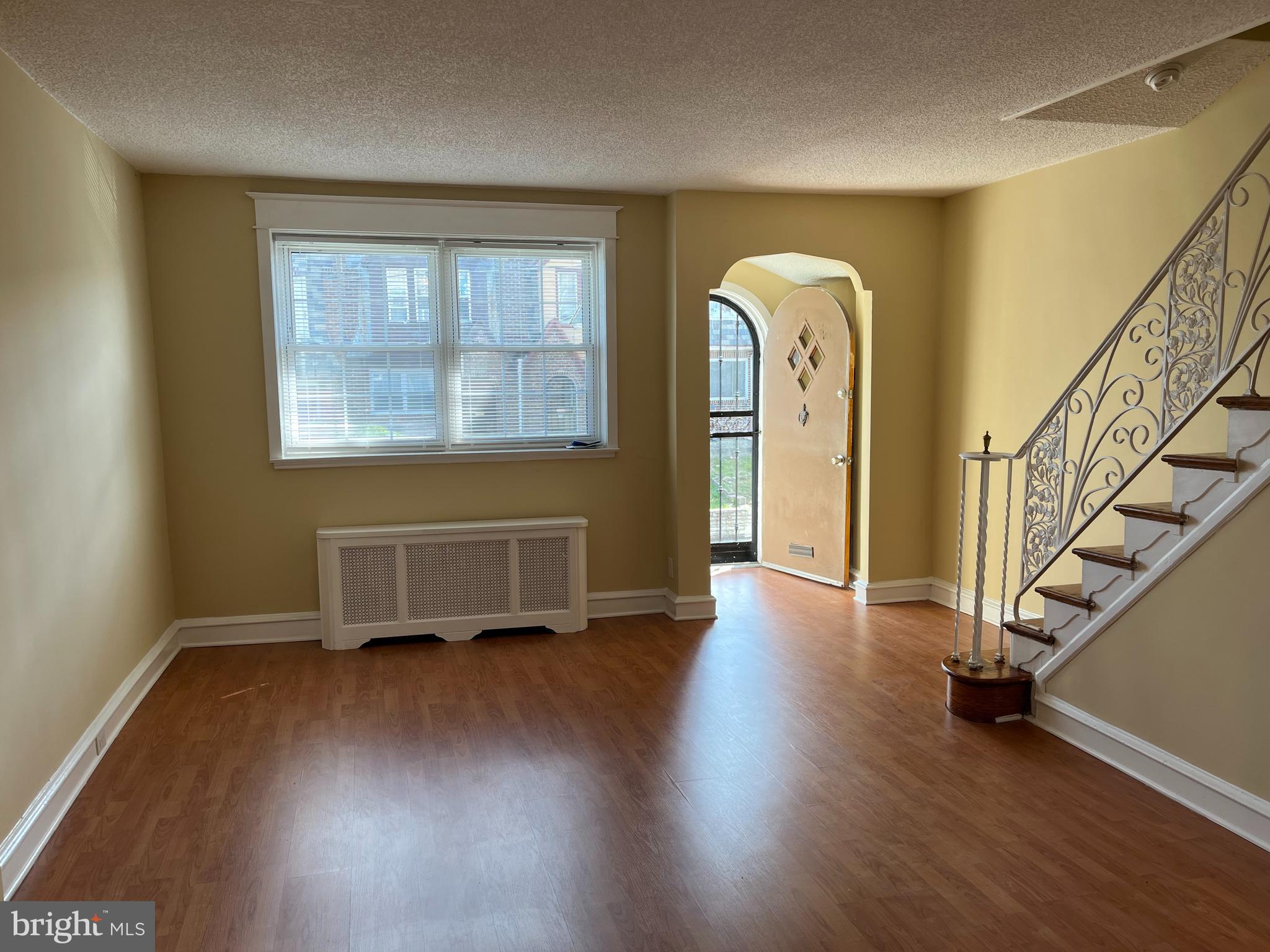 1323 Gilham Street Philadelphia, PA 19111 - Photo 5 of 35 a view of empty room with wooden floor and fan
