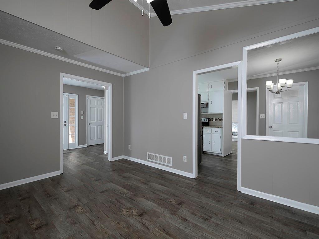 581 Autumn Lane Marietta, GA 30068 - Photo 15 of 28 wooden floor in an empty room with a window