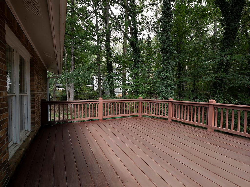 581 Autumn Lane Marietta, GA 30068 - Photo 27 of 28 a view of balcony with wooden floor and fence