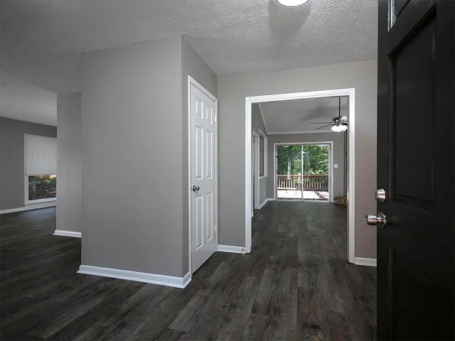 wooden floor in a hall with an entryway