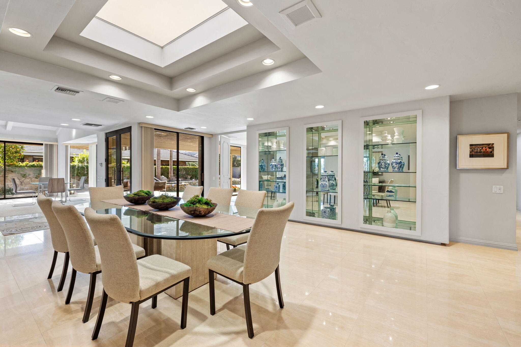 95 Mayfair Drive Rancho Mirage, CA 92270 - Photo 34 of 74 a dining room with furniture and window