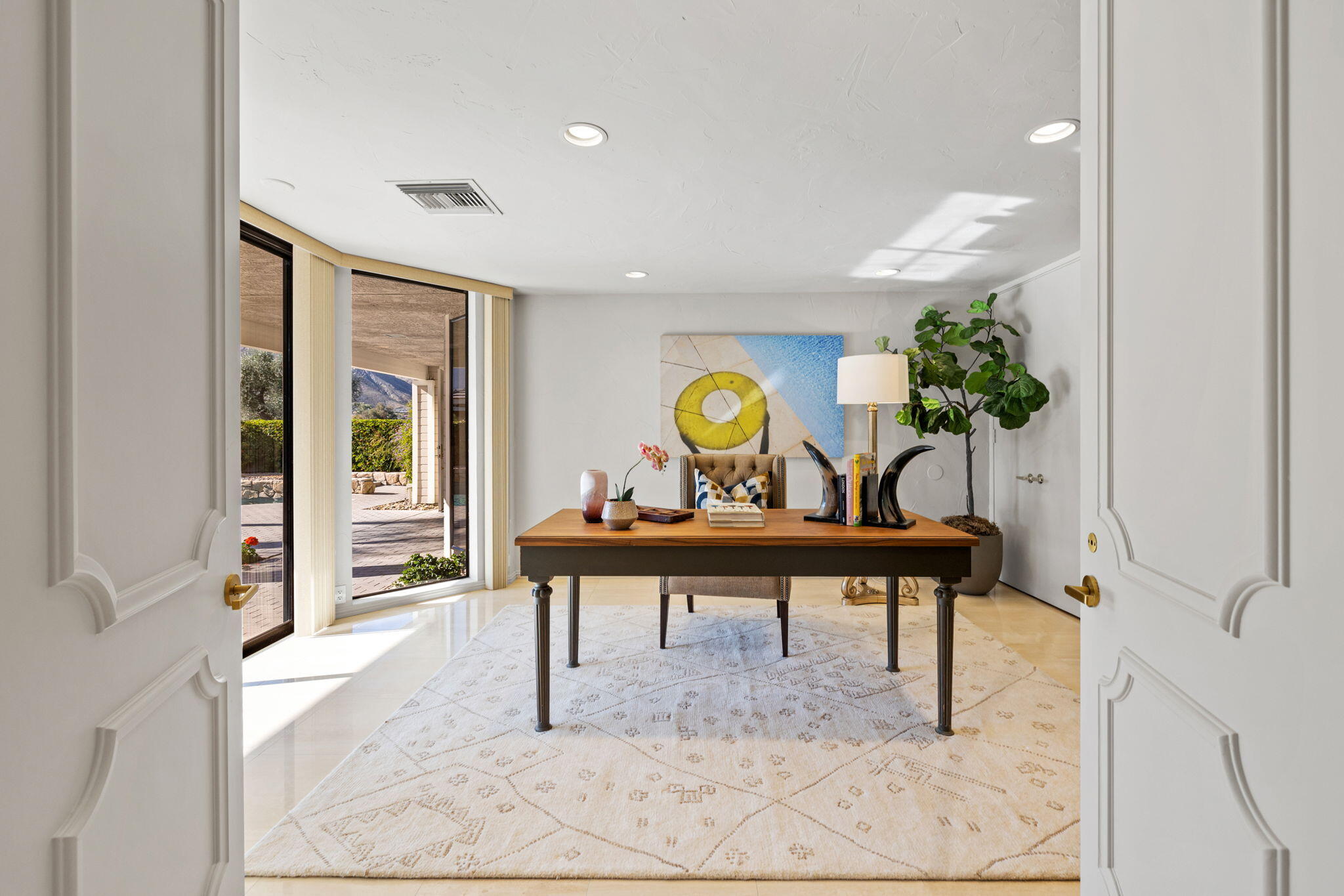 95 Mayfair Drive Rancho Mirage, CA 92270 - Photo 37 of 74 a view of a livingroom with furniture window and wooden floor