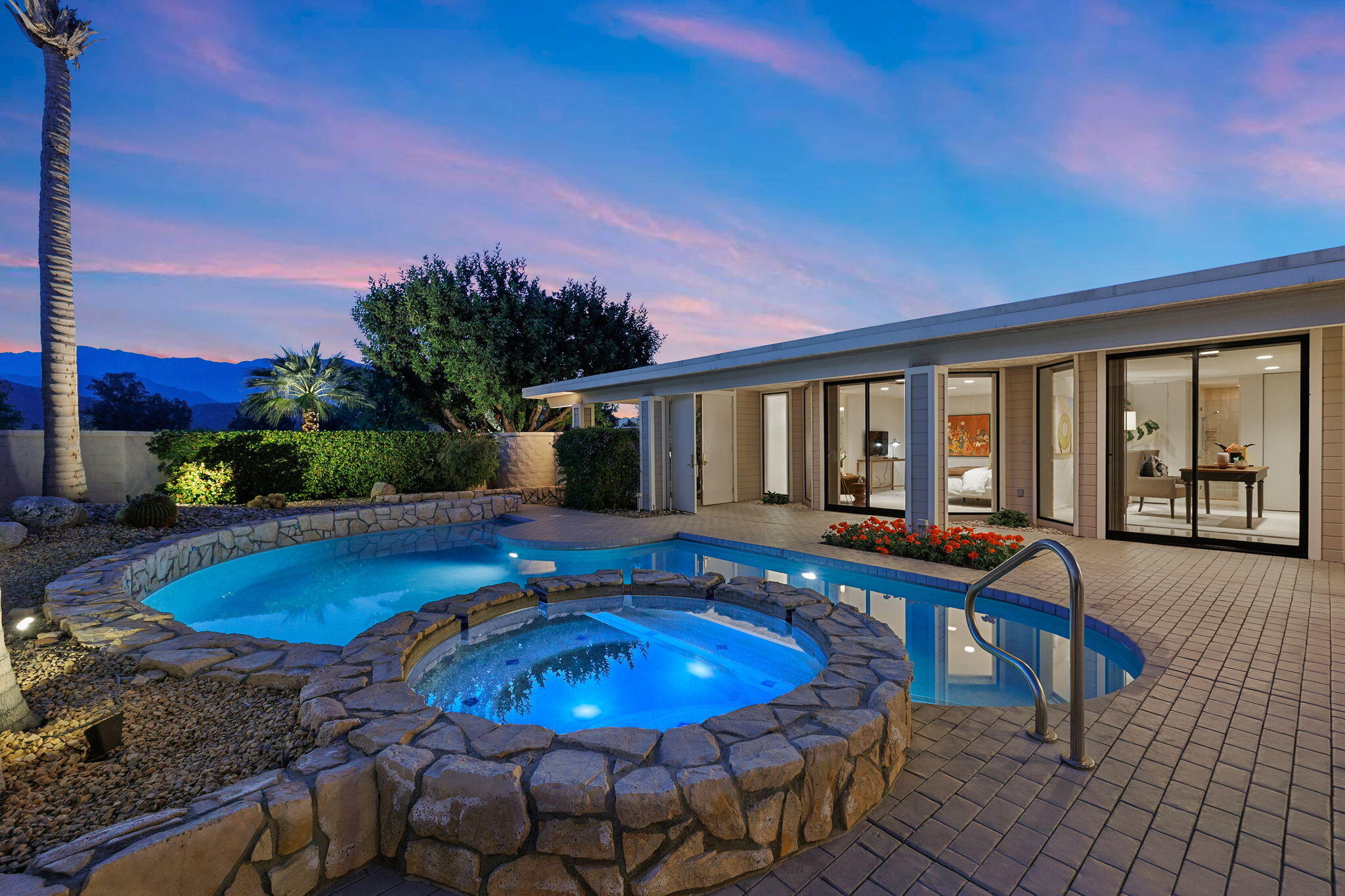 95 Mayfair Drive Rancho Mirage, CA 92270 - Photo 62 of 74 a view of a house with backyard patio and swimming pool