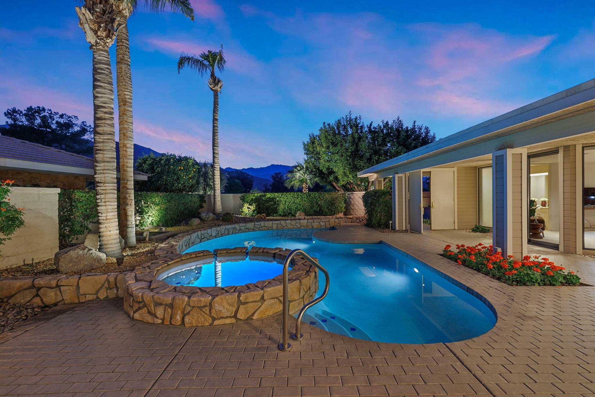 95 Mayfair Drive Rancho Mirage, CA 92270 - Photo 63 of 74 a swimming pool with outdoor seating yard and barbeque oven